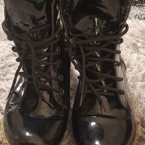 Black patent combat boots